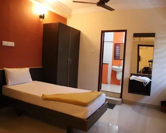 Namaskar Hotel - Kumbakonam - Schlafzimmer