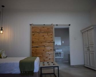 Symponia Guesthouse - Ghanzi - Habitación