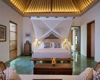 Tandjung Sari Hotel - Denpasar - Schlafzimmer
