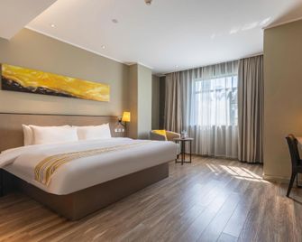 Home Inn Plus Suzhou Guogou Plaza Suhuai North Road - Suzhou - Slaapkamer