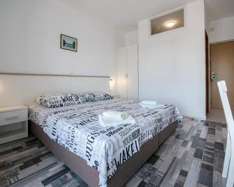 Picic Guesthouse - Luka - Ložnice