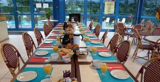 Appart'Hotel Les Acacias - Obernai - Restaurante