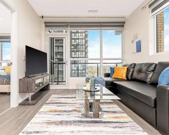 Private Patio - City Views - Garment St Condos - Kitchener - Living room