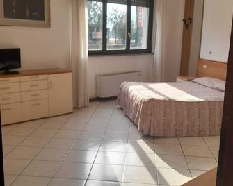 호텔 레지던스 라 폰타나 - 마리아노 코멘세 - 침실