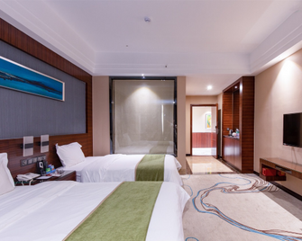Ostar Holiday Hotel - Zhanjiang - Bedroom