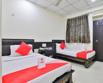 Hotel O Lotus Residency - Daman - Ložnice