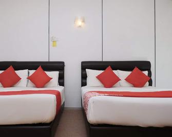 OYO 90180 Gemilang Hotel Kerteh - Dungun - Bedroom