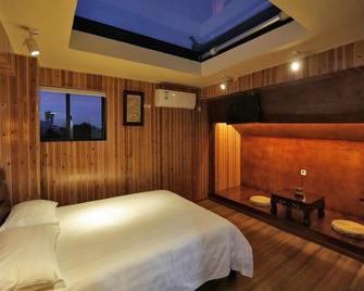Fairyland Hotel Dali Yang Ren Street Xin Min Road Branch - Dali - Κρεβατοκάμαρα