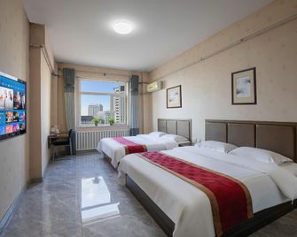 Langman Xiaowu Apartment Hotel - هاربين - غرفة نوم