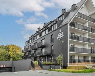 Podczele Seashore SPA & Jacuzzi Apartments with Parking by Noclegi Renters - Kolobrzeg - Building