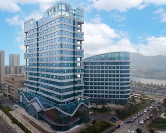 Ji Hotel (Luzhou Aiqinhai Shopping Center) - Luzhou - Building