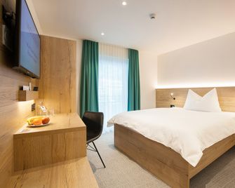 Hotel Vaduzerhof by b-smart - ואדוז - חדר שינה