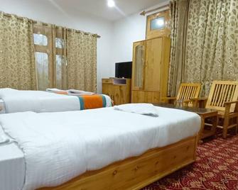 Hotel Ldumra Oasis - Hundar - Bedroom