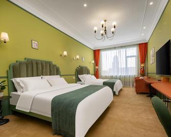 Shanghai Dolemi Mengmengwu Hotel - Shangai - Habitación
