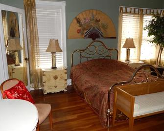 Château sur Mer Bed & Breakfast - ווינת'ורפ - חדר שינה