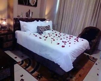 Ditsaleng Bed and Breakfast - Vanderbijlpark - Schlafzimmer