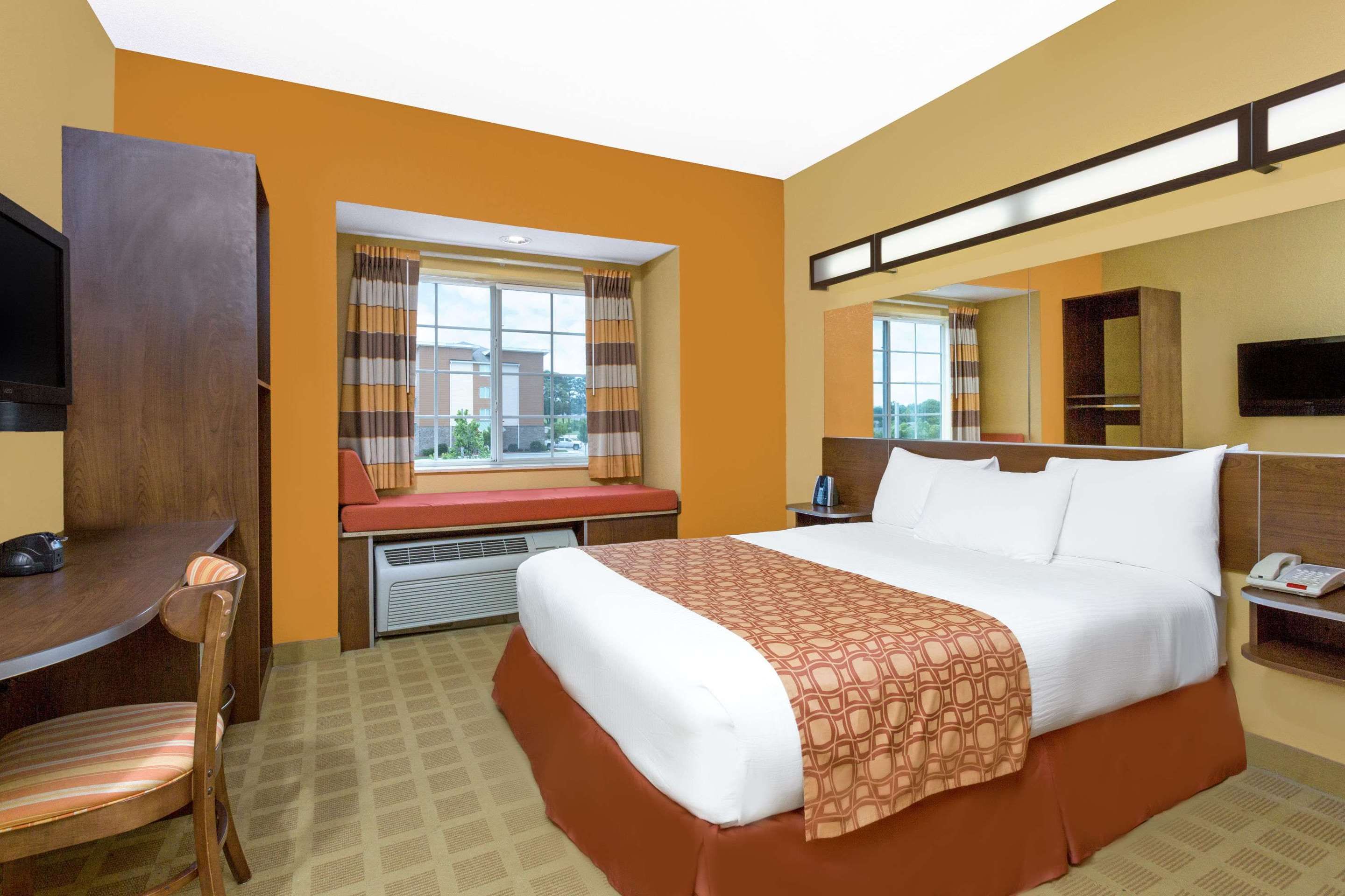 Microtel Inn & Suites by Wyndham Greenville/University Med - Greenville - Yatak Odası