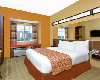 Microtel Inn & Suites by Wyndham Greenville/University Med - Greenville - Yatak Odası
