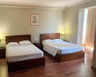 Hotel Puma - Moreira - Habitación