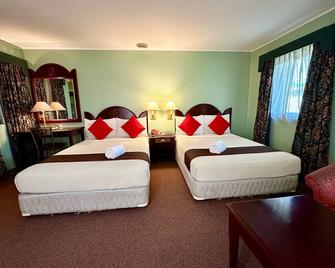 Palladium Suites Hotel - Cebu City - Bedroom