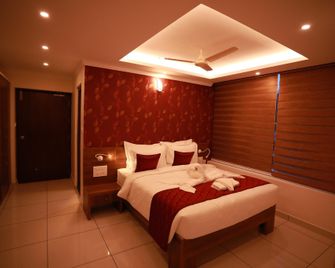 Collection O Companion Leisure Homes - Kovalam - Schlafzimmer