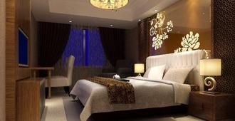 Taizhou Peace International Hotel - Taizhou - Bedroom