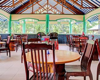 Capital O 90417 Hotel Batu Suli Internasional - Палангкарая - Ресторан