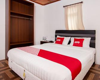 OYO 1812 Dg Inn - Tuktuk Sonak - Habitación