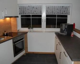 Ferienwohnung Gigi - Steeg - Keuken