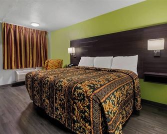 Monsoon Inn - Beaumont - Makuuhuone