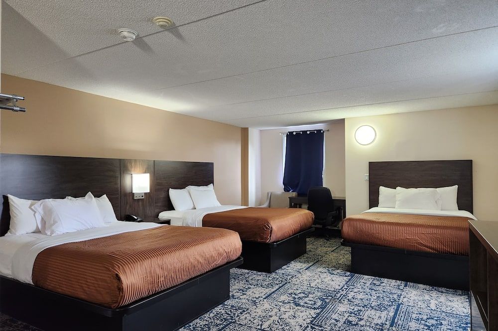 Bedroom view of Falls Lodge and Suites