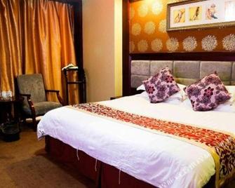 Jinluowan Hotel - Ji'an (Repubblica Popolare Cinese) - Camera da letto