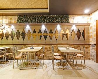 Treebo Apollo - Guwahati - Restaurant