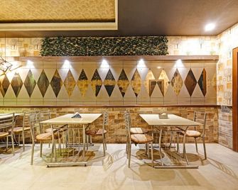 تريبو أبولو - جواهاتي - مطعم