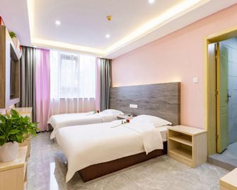 Jinpeng Business Hotel - Luo-jang - Ložnice