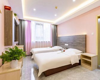 Jinpeng Business Hotel - לואויאנג - חדר שינה