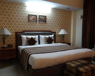 Angel Residency - Greater Noida - Schlafzimmer