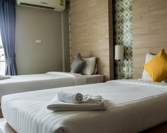 Chinotel - Phuket - Schlafzimmer