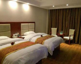 Greentree inn Suqian Sihong Passenger Station Zhongyuan Logistics District Hotel L - Suqian - Bedroom