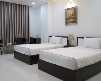 Aladdin Hotel - הו צ'י מין סיטי - חדר שינה
