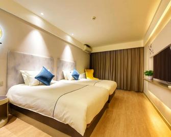Magnotel Hotel Chengdu Taikoo Li Dongfeng Bridge A - Chengdu - Bedroom
