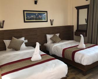 Hotel Guru - Pokhara - Bedroom