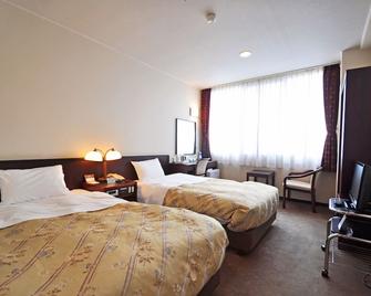 Myoko Sunshine Hotel - Jōetsu - Спальня