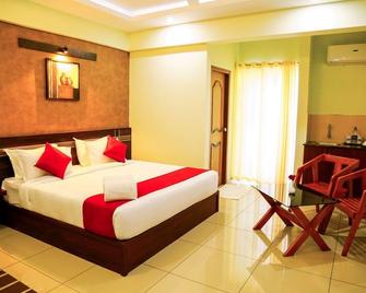 Akan Hotels & Residence - Meppādi - Habitación