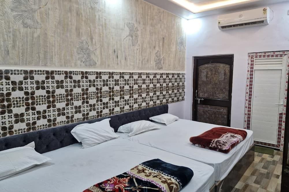 Krishna Inn - Prayagraj - Bedroom