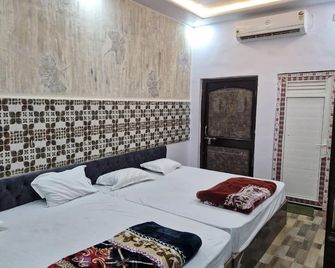 Krishna Inn - Prayagraj - Bedroom