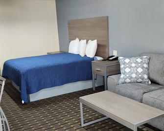 Economy Inn - Orange - Bedroom