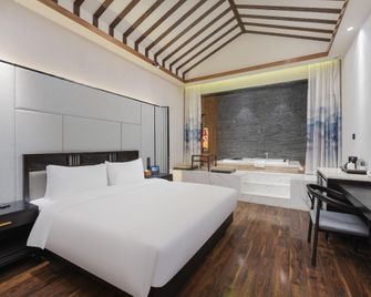 Manxin Hotel Nanjing Jinlingyin - Nanjing - Slaapkamer