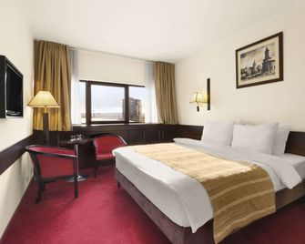 Ramada by Wyndham Iasi City Centre - Iaşi - Bedroom