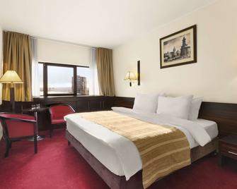 رامادا باي ويندام لاسي سيتي سنتر - يازي - غرفة نوم